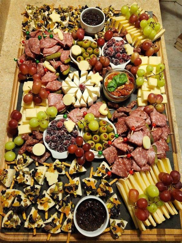 Build-your-own charcuterie board loaded with Canadian artisan cheeses, cured meats, grapes and olives