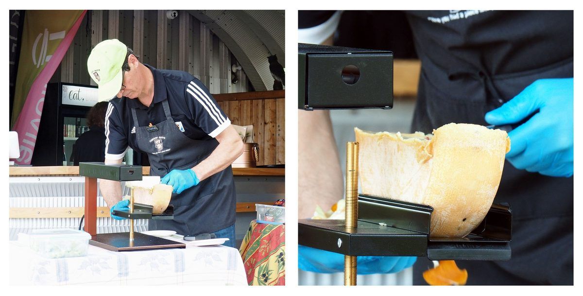 Mark in his The Cheesy Guys Inc. apron working the raclette melter at the pop-up, melting the half-wheel and scraping it hot, beside a close-up of the cheese on the grill